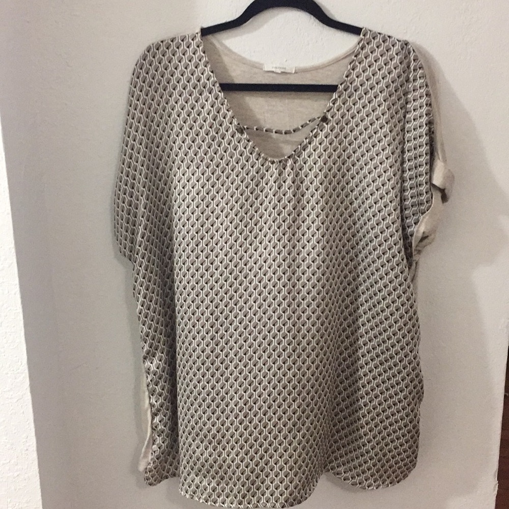 Cream blouse with neck detail and cuffed sleeves